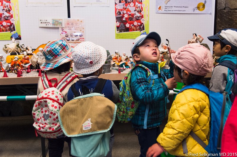 20150312_103736 D4S.jpg - Children visiting museum area at Nagoya Castle.  Well-mannered and quite interested in what they see.